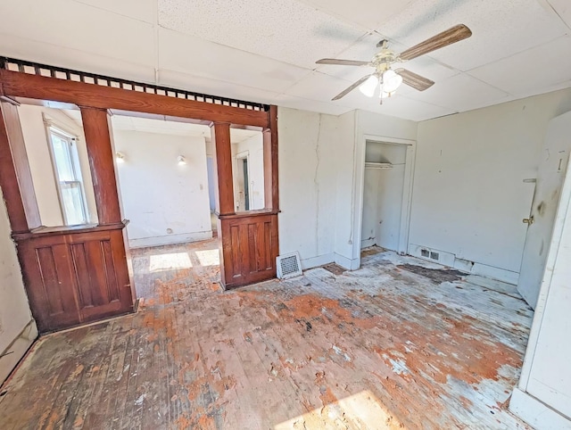 interior space featuring a ceiling fan and wood-type flooring