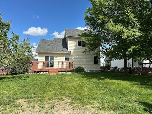 322 N 15th Ave, Winterset, IA 50273 - rear view of property featuring a wooden deck and a shingled roof