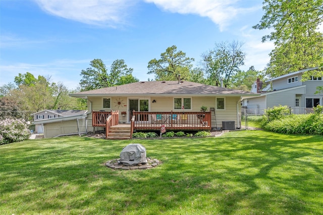 back of property with a wooden deck and cooling unit