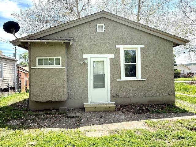 2036 Capitol Ave, Des Moines, IA 50317 - view of front of house with stucco siding