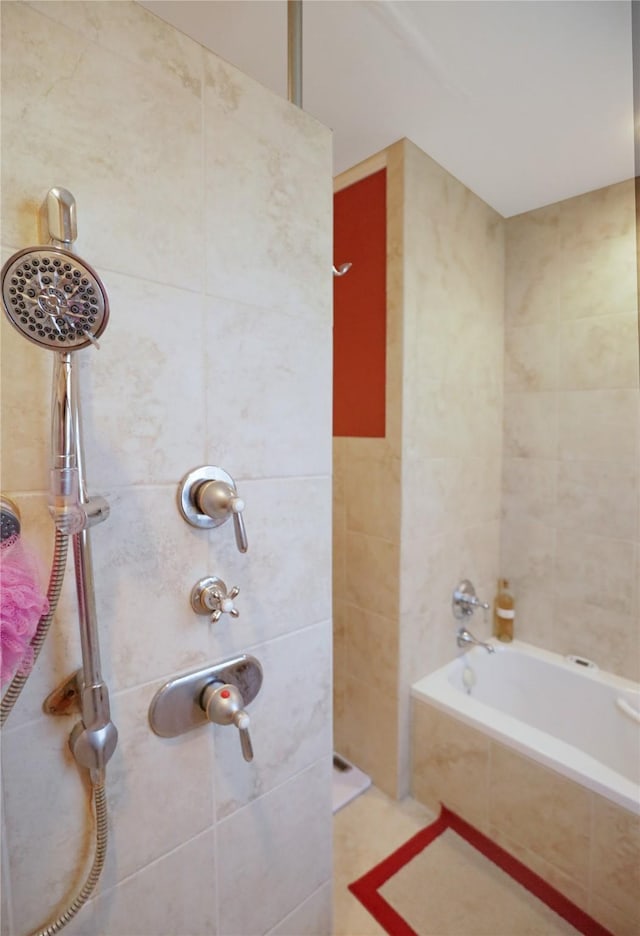 full bath with tiled shower and tiled tub
