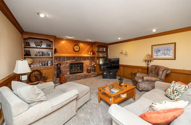 10760 Elmcrest Dr, Clive, IA 50325 - carpeted living room with a textured ceiling, wainscoting, wooden walls, ornamental molding, and built in shelves