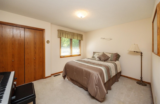 10760 Elmcrest Dr, Clive, IA 50325 - bedroom with light carpet and baseboards