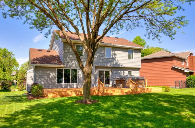 5433 NW 89th St, Johnston, IA 50131 - back of property with a wooden deck