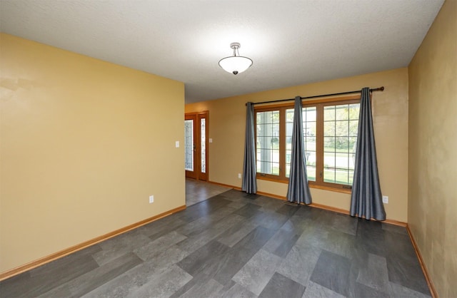 5433 NW 89th St, Johnston, IA 50131 - spare room featuring baseboards
