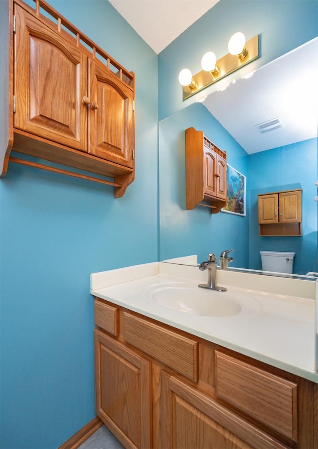 5433 NW 89th St, Johnston, IA 50131 - bathroom with toilet and vanity