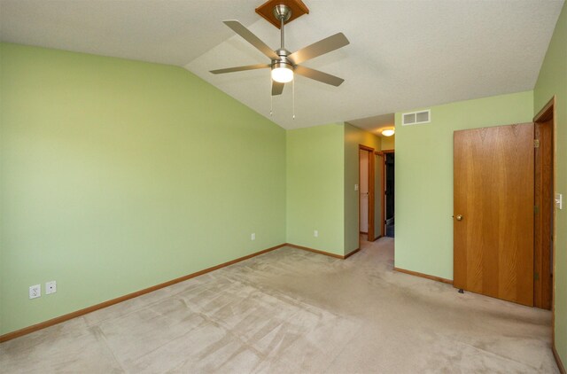 5433 NW 89th St, Johnston, IA 50131 - unfurnished bedroom with vaulted ceiling, baseboards, carpet floors, and ceiling fan