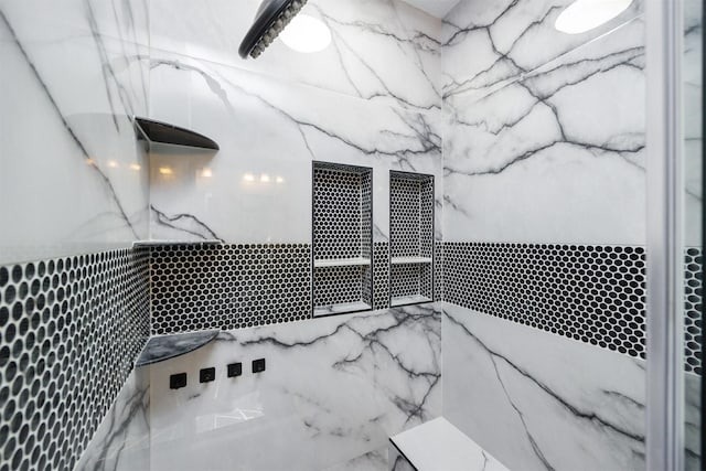 5433 NW 89th St, Johnston, IA 50131 - full bathroom with a marble finish shower