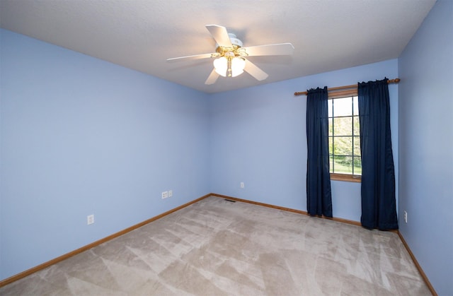 5433 NW 89th St, Johnston, IA 50131 - carpeted spare room with baseboards and ceiling fan