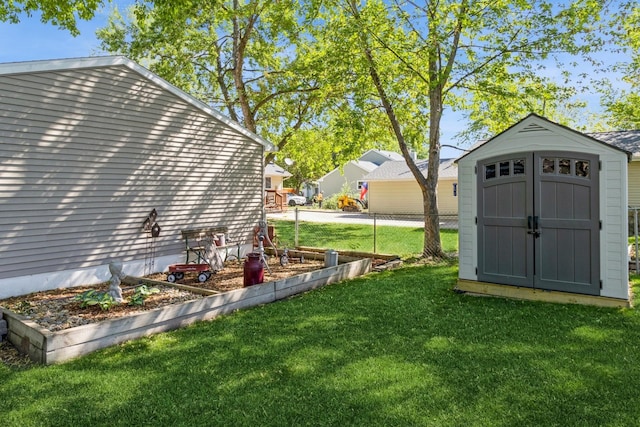 604 NE 8th St, Grimes, IA 50111 - view of yard featuring a storage unit and an outdoor structure