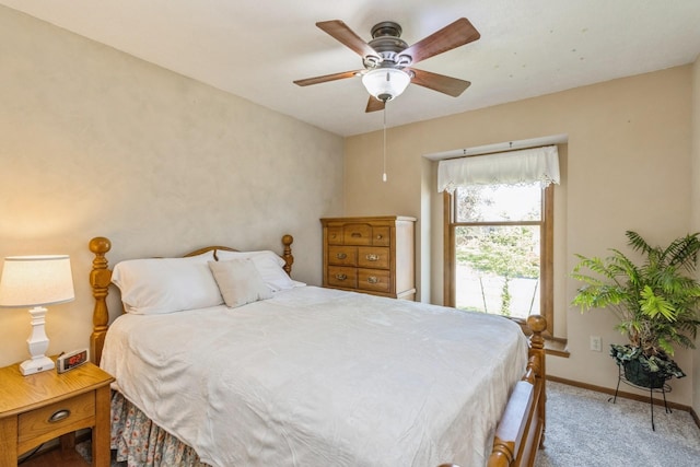 604 NE 8th St, Grimes, IA 50111 - bedroom featuring carpet flooring, baseboards, and ceiling fan