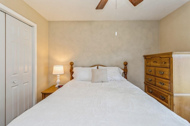 604 NE 8th St, Grimes, IA 50111 - bedroom featuring a closet and ceiling fan