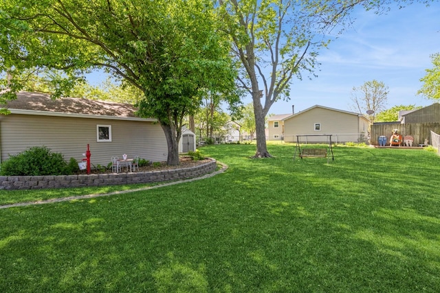 604 NE 8th St, Grimes, IA 50111 - view of yard with a storage shed and an outdoor structure