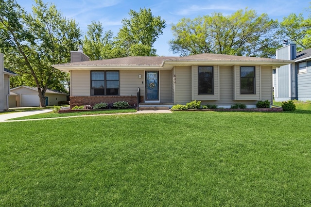 604 NE 8th St, Grimes, IA 50111 - ranch-style home featuring a chimney, a front yard, and brick siding