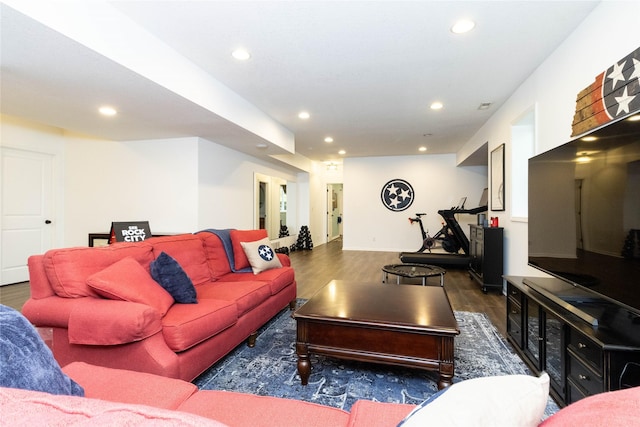 living area featuring wood finished floors and recessed lighting