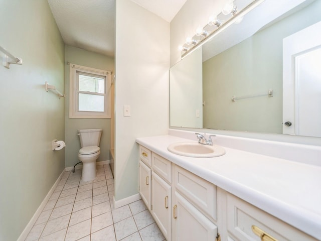 3800 Western Hills Dr, West Des Moines, IA 50265 - bathroom featuring vanity, toilet, tile patterned flooring, tub / shower combination, and baseboards