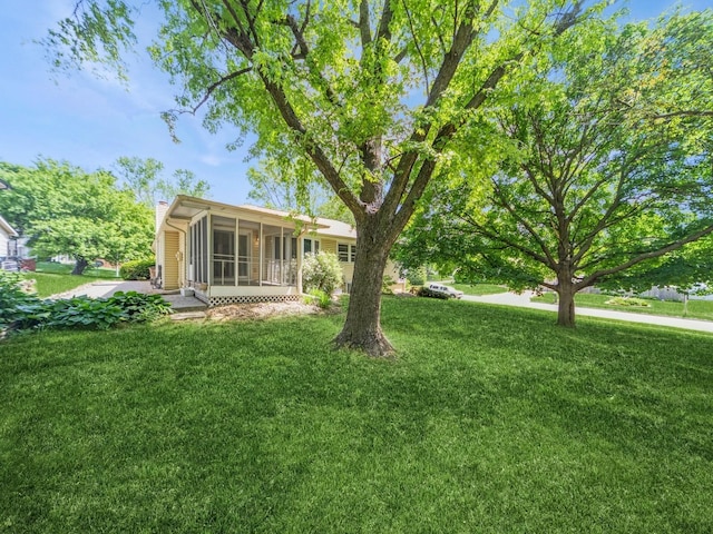 3800 Western Hills Dr, West Des Moines, IA 50265 - view of green lawn featuring a sunroom