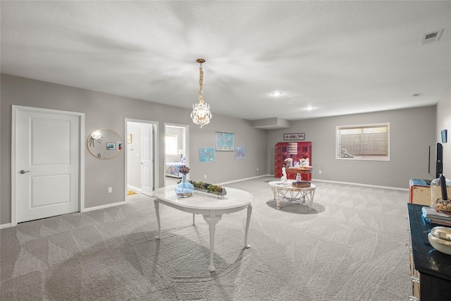 4400 132nd St, Urbandale, IA 50323 - living area featuring carpet floors, baseboards, and a chandelier