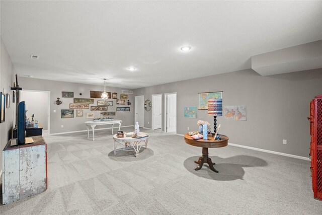 4400 132nd St, Urbandale, IA 50323 - living area with light carpet, baseboards, and recessed lighting