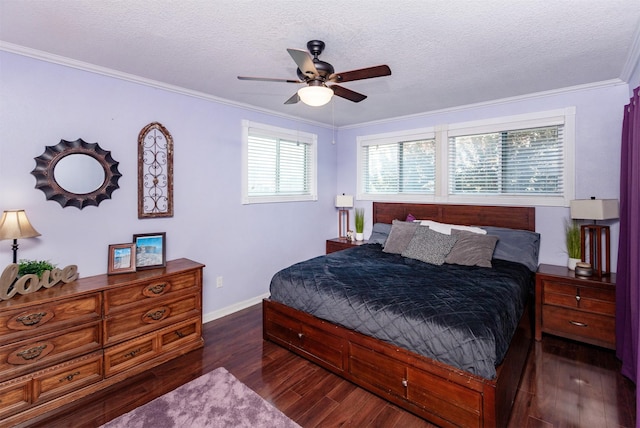 1807 11th St, Des Moines, IA 50314 - bedroom featuring dark wood-style floors, a textured ceiling, baseboards, ornamental molding, and ceiling fan