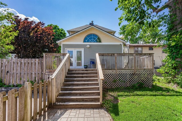 1807 11th St, Des Moines, IA 50314 - back of house with a wooden deck and stairway