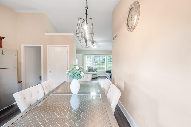 208 Mckinley Ave, Des Moines, IA 50315 - dining space with a chandelier and baseboards