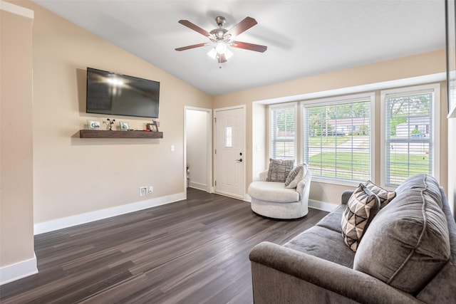 208 Mckinley Ave, Des Moines, IA 50315 - living area featuring baseboards, lofted ceiling, dark wood-type flooring, and a ceiling fan