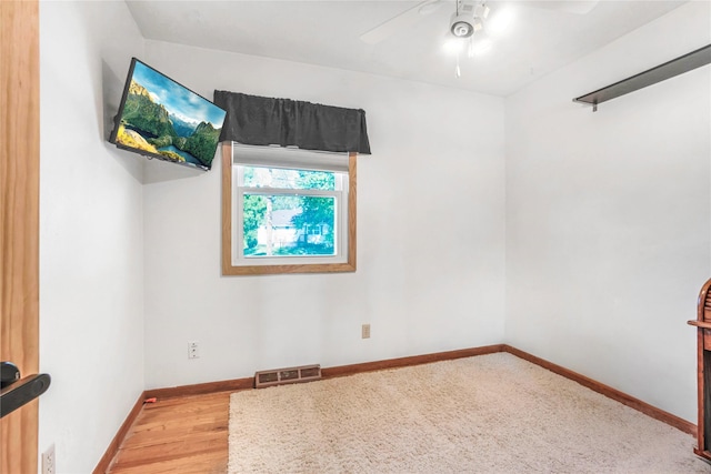 2106 62nd St, Des Moines, IA 50322 - empty room featuring ceiling fan, baseboards, and wood finished floors