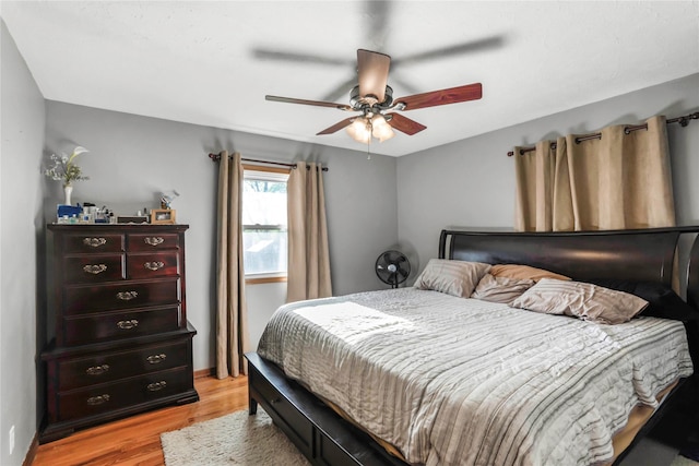 2106 62nd St, Des Moines, IA 50322 - bedroom featuring light wood-type flooring and a ceiling fan