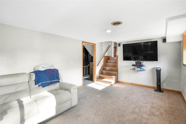 2106 62nd St, Des Moines, IA 50322 - carpeted living area featuring stairway and baseboards