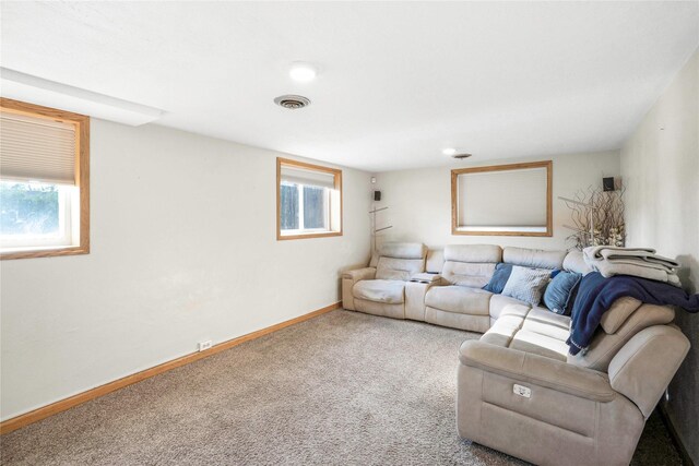 2106 62nd St, Des Moines, IA 50322 - carpeted living room featuring baseboards