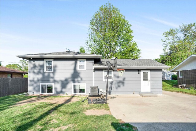 2106 62nd St, Des Moines, IA 50322 - back of property featuring a patio and central AC unit