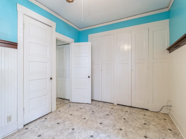 1070 37th St, Des Moines, IA 50311 - unfurnished bedroom featuring light flooring
