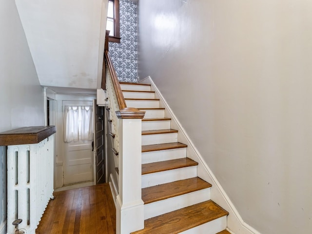 1070 37th St, Des Moines, IA 50311 - staircase with wood finished floors