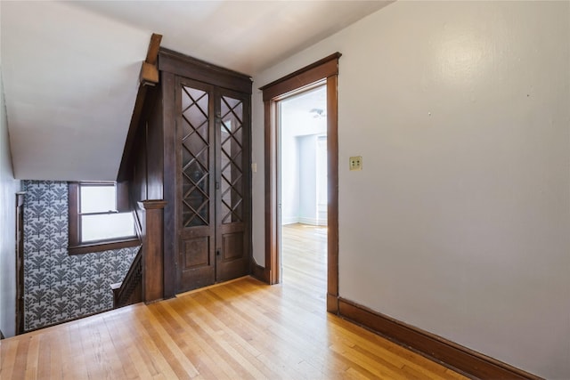 1070 37th St, Des Moines, IA 50311 - foyer with light wood-style floors and baseboards