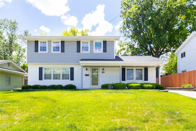 view of front of home with brick siding