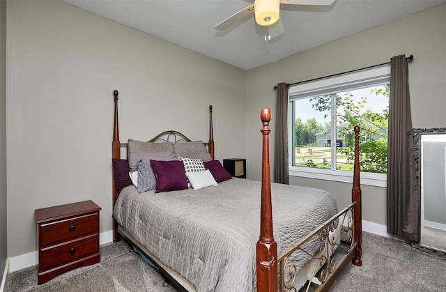 1412 NE Aspen Ct, Grimes, IA 50111 - carpeted bedroom with baseboards and a ceiling fan