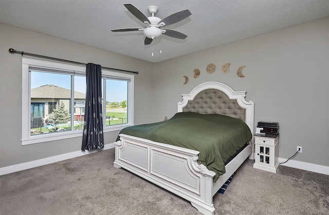 1412 NE Aspen Ct, Grimes, IA 50111 - bedroom featuring carpet floors, baseboards, a ceiling fan, and a textured ceiling