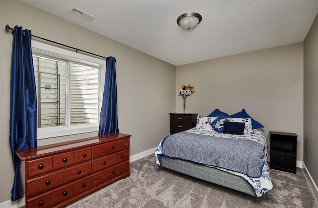 1412 NE Aspen Ct, Grimes, IA 50111 - bedroom with carpet flooring, baseboards, and a textured ceiling