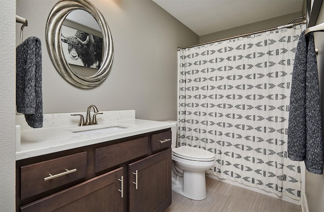 1412 NE Aspen Ct, Grimes, IA 50111 - full bath with vanity, toilet, and a shower with shower curtain