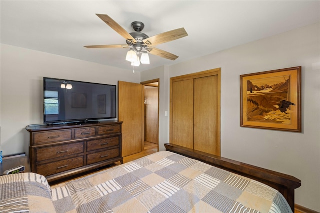 bedroom featuring a closet and a ceiling fan