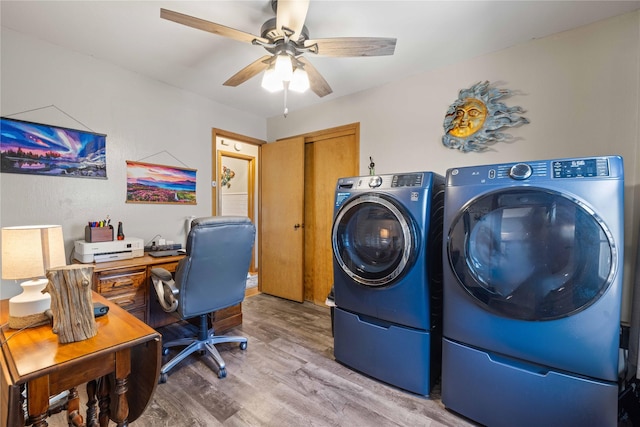 laundry area with washer and clothes dryer, wood finished floors, ceiling fan, and a desk