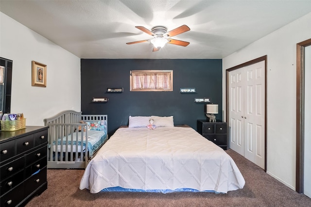 630 E Clay St, Osceola, IA 50213 - bedroom featuring carpet flooring, ceiling fan, and a closet