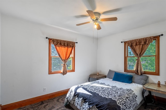 630 E Clay St, Osceola, IA 50213 - bedroom featuring a ceiling fan and baseboards