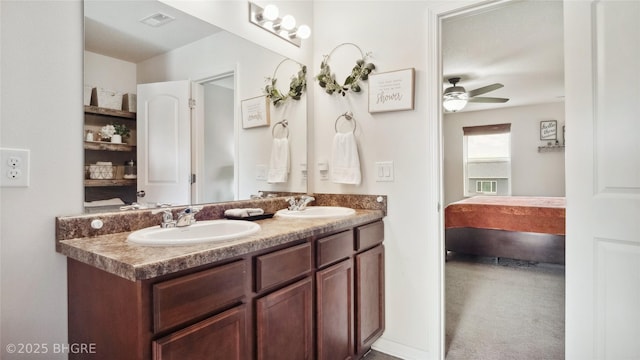 1508 E Euclid Ave, Indianola, IA 50125 - ensuite bathroom featuring a ceiling fan and double vanity