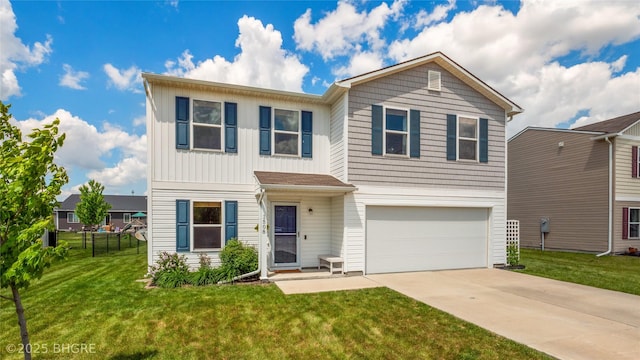 1508 E Euclid Ave, Indianola, IA 50125 - view of front facade featuring a garage, driveway, and board and batten siding