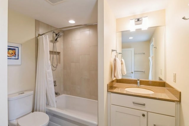 3312 Oakland St, Ames, IA 50014 - full bath with toilet, shower / tub combo with curtain, vanity, and recessed lighting