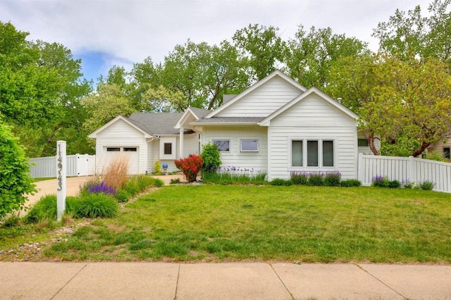 14943 Holcomb Ave, Clive, IA 50325 - view of front facade with a garage and driveway