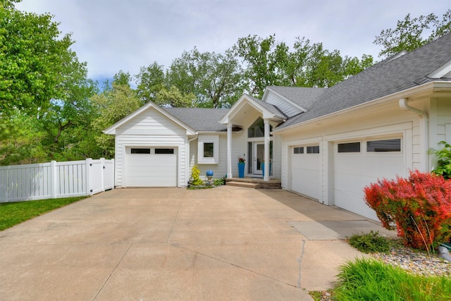 14943 Holcomb Ave, Clive, IA 50325 - ranch-style house featuring concrete driveway, a shingled roof, and an attached garage