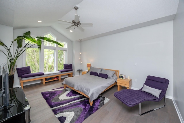14943 Holcomb Ave, Clive, IA 50325 - bedroom with lofted ceiling, baseboards, wood finished floors, and a ceiling fan